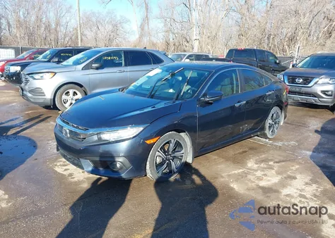 2018 Honda Civic Touring z USA, uszkodzony, nr VIN 19XFC1F91JE001194